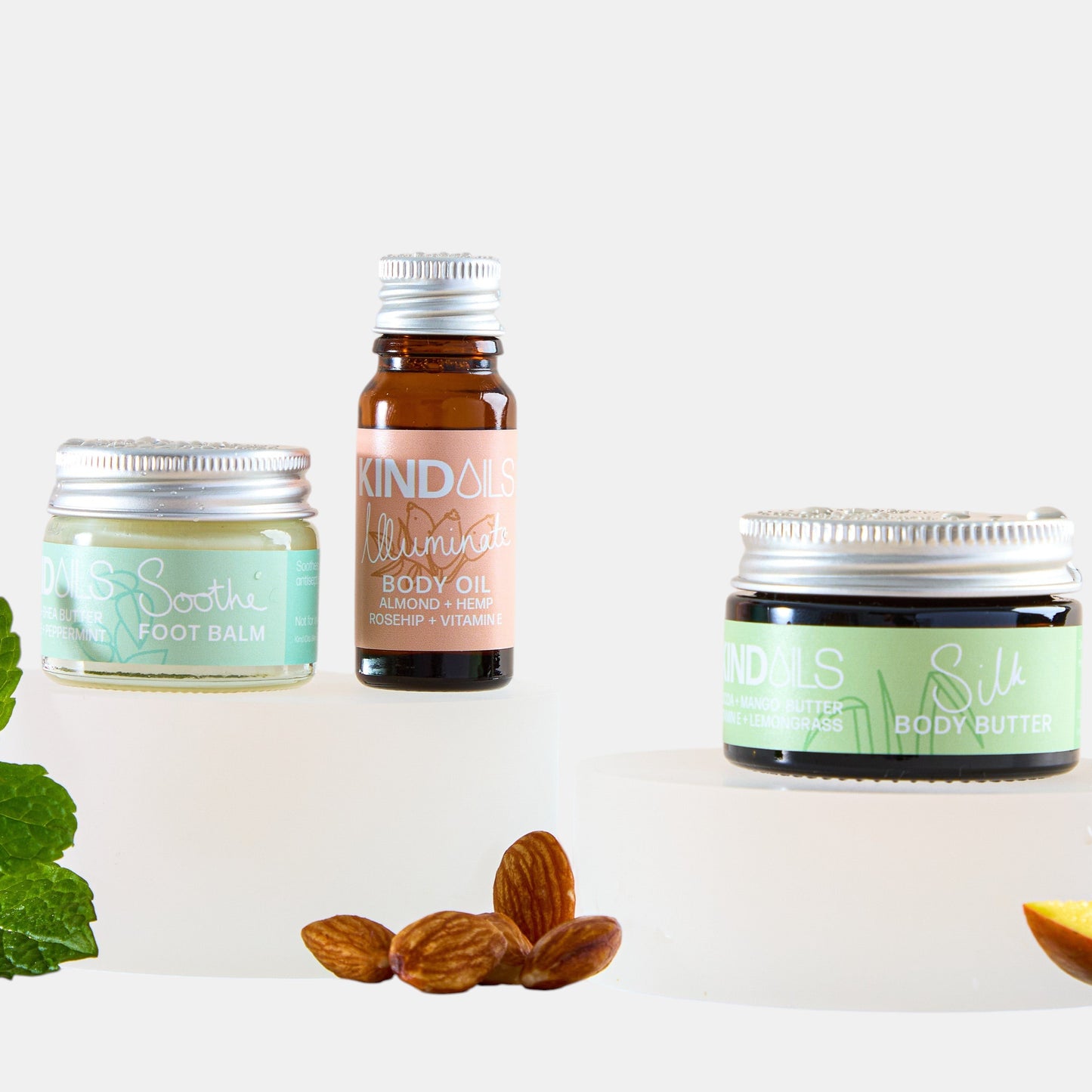 Collection of skincare products including jars and a bottle on a light background