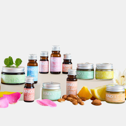 Collection of skincare products with 'Kind & Co' branding on a white background